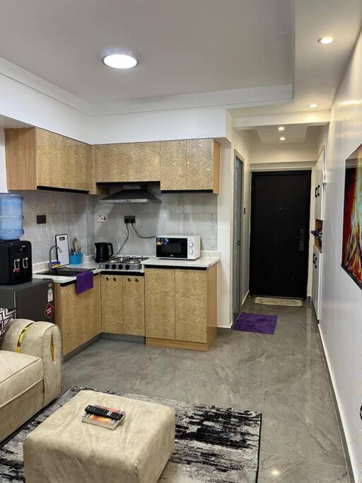 Elegant 1 Bed Near Yaya Centre With Gym *